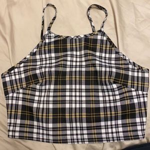 Size medium. Its grey, black, yellow and white top